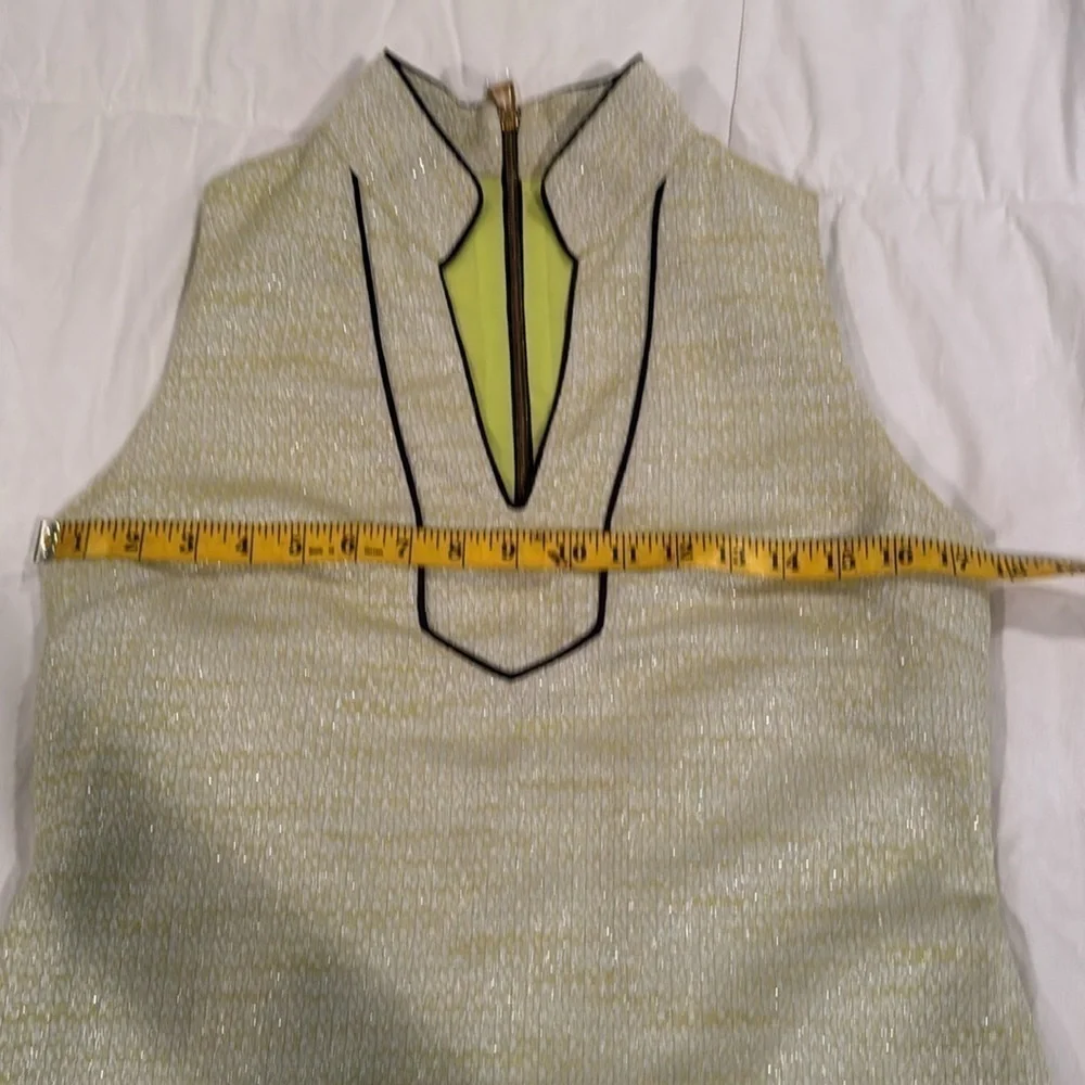 Sail to Sable green dress with silver white and black trim around neck